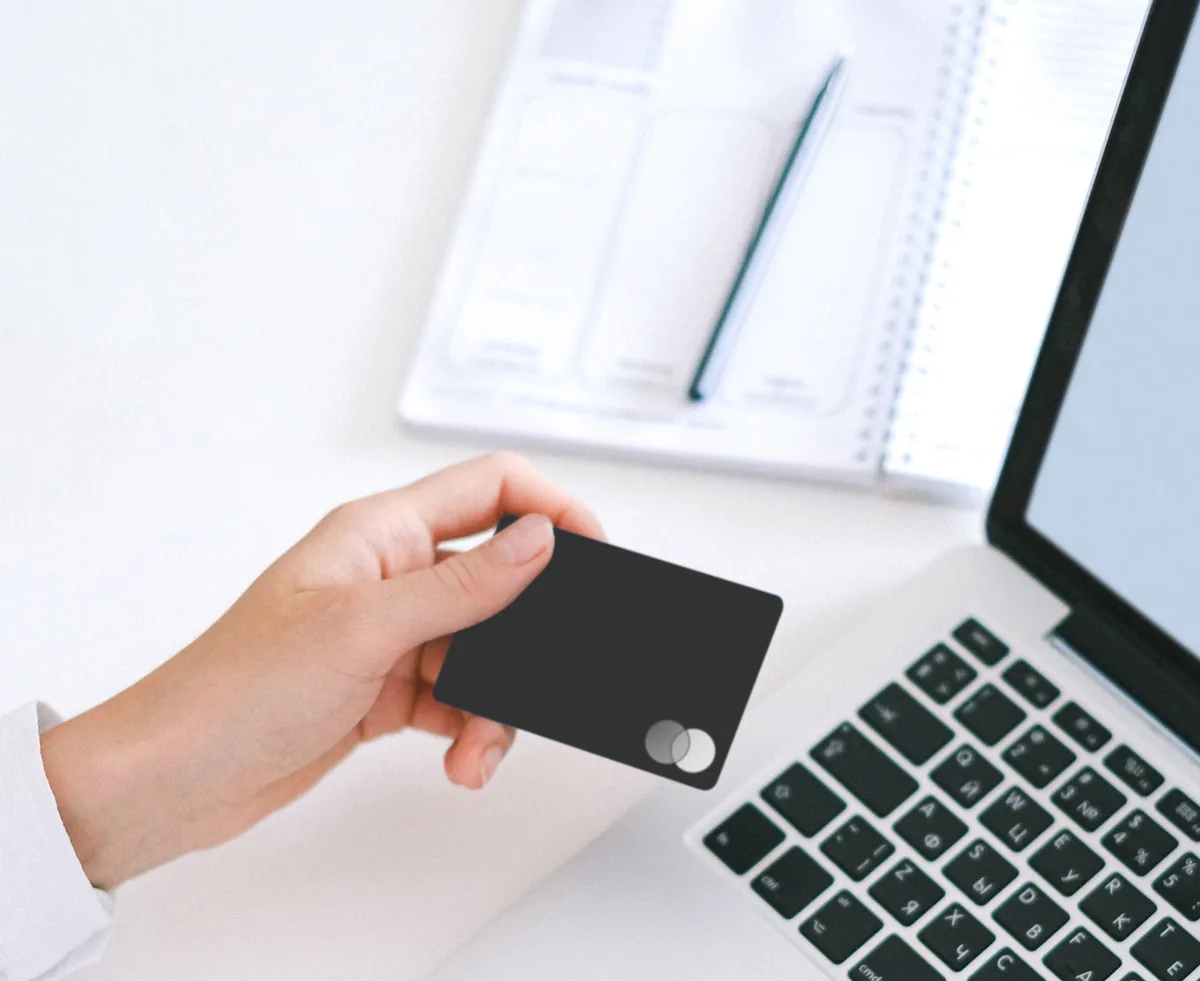 A patient settling their account by credit card